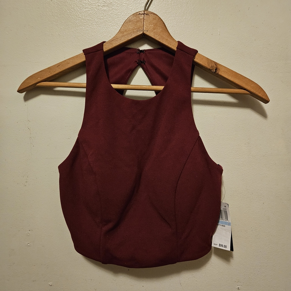 Elegant Burgundy Sleeveless Top And Floral Skirt Set